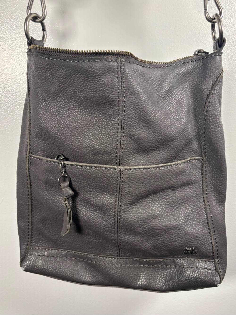 The Sak Charcoal Pebbled Leather Crossbody with Chain Strap